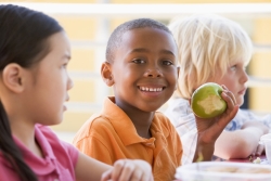 Children Eating Fruit